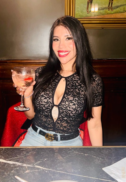 Adult woman looking at the camera before a video conversation